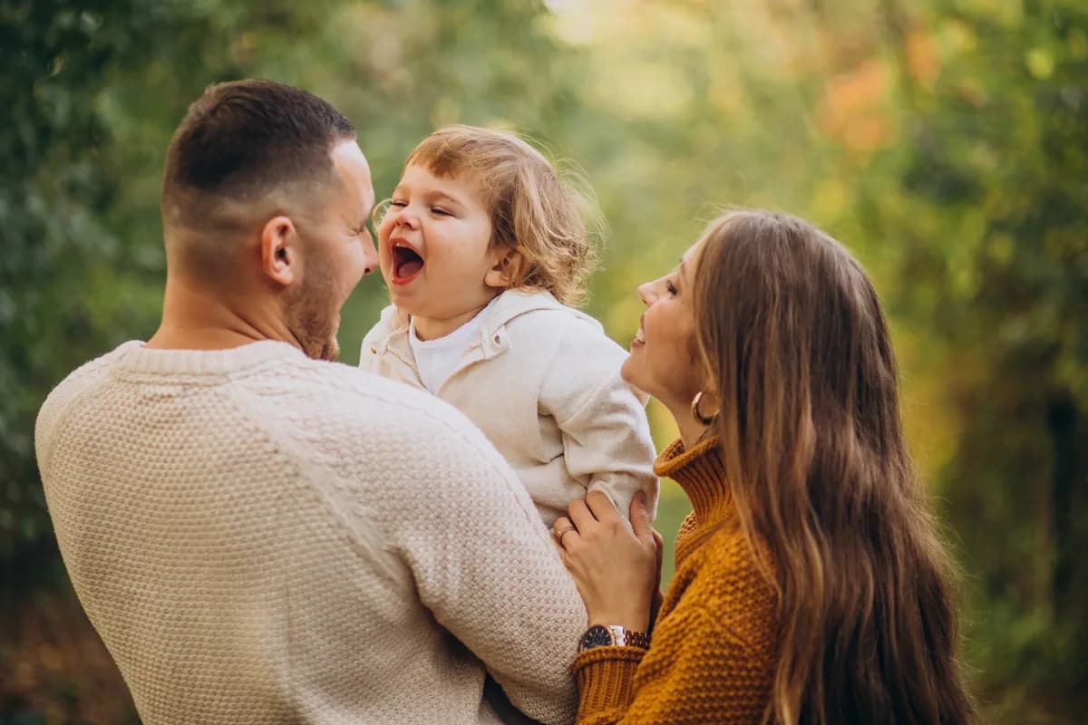 A young family enjoying time together, representing coordinated whole-family care